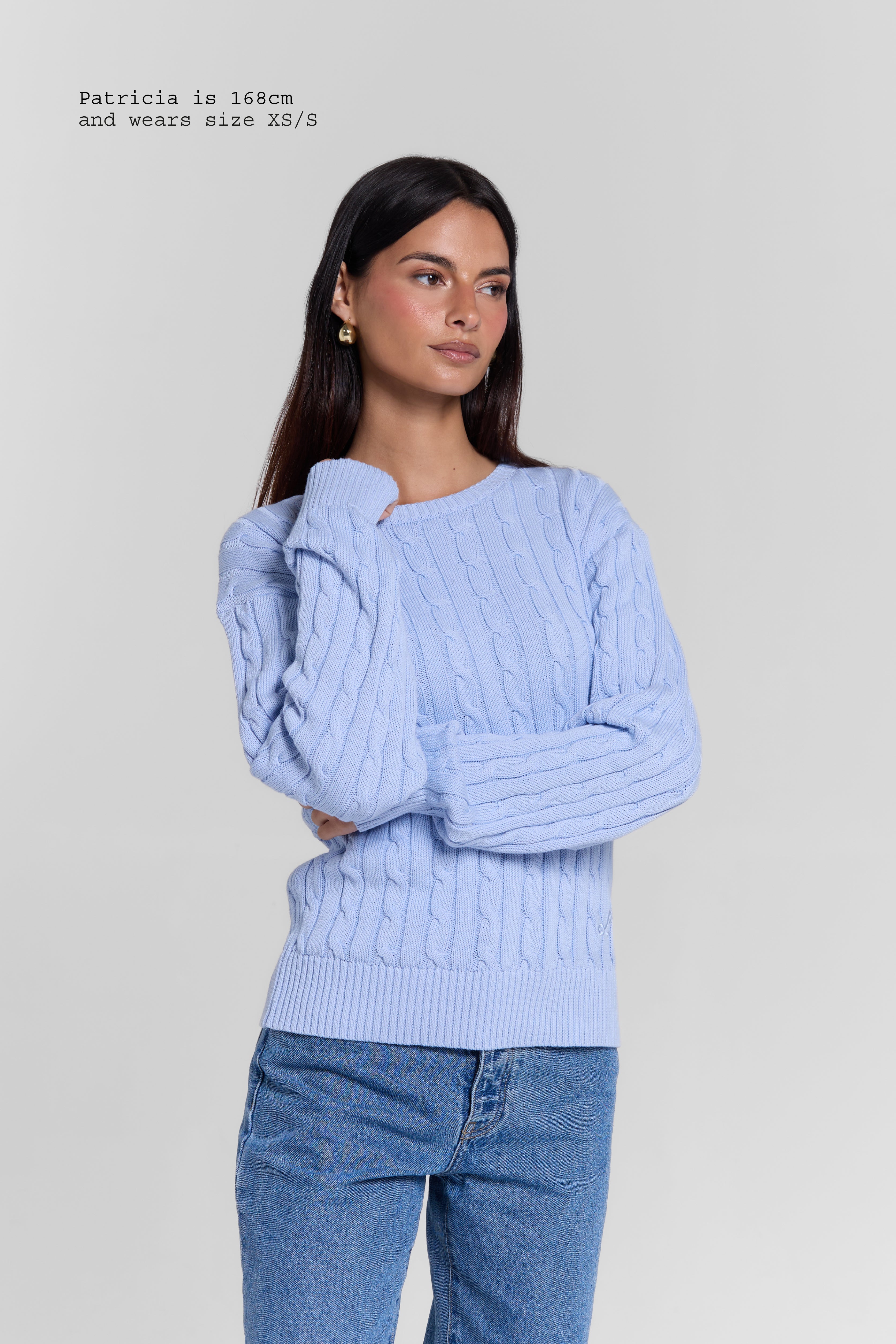 CABLE-KNIT SWEATER