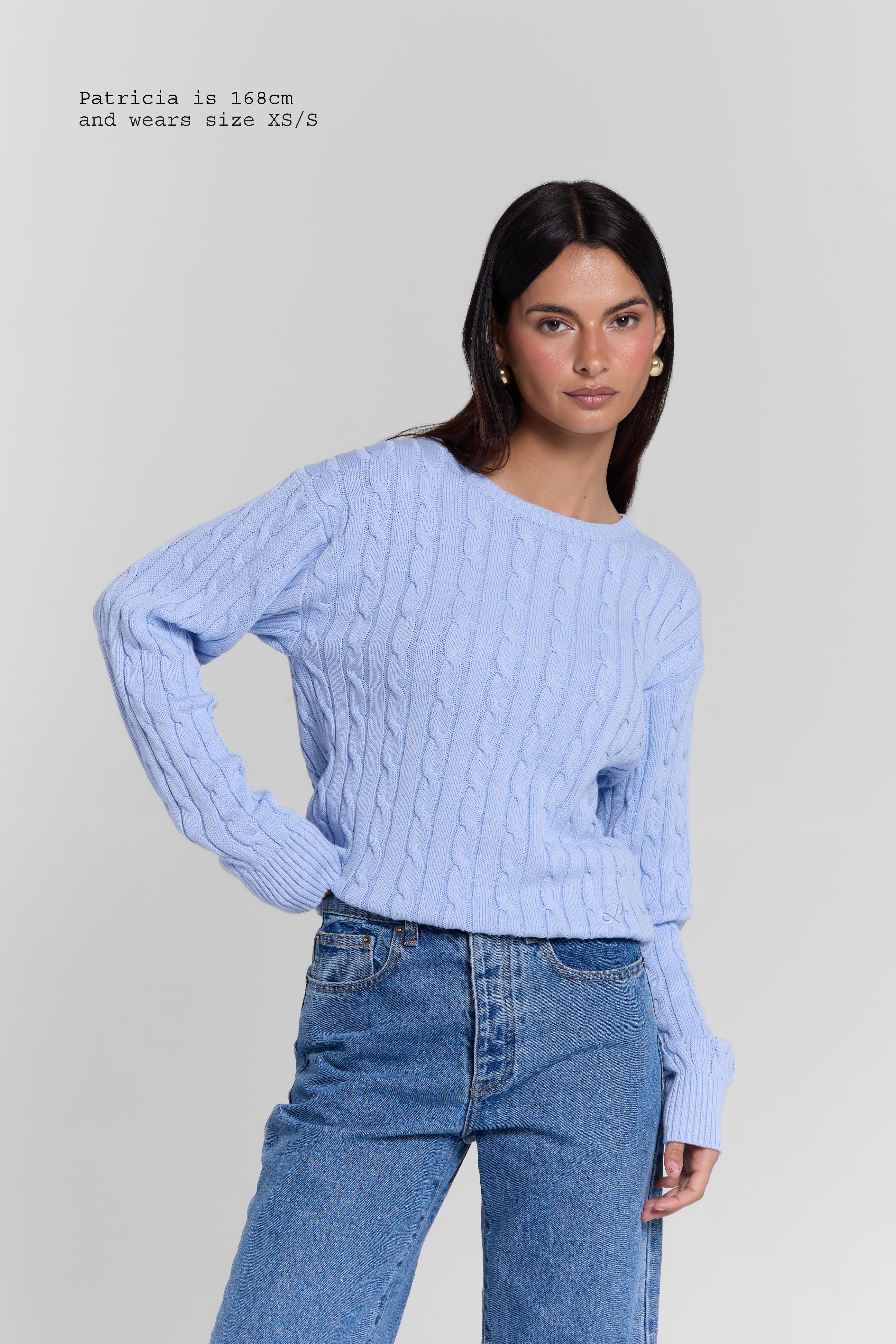 CABLE-KNIT SWEATER