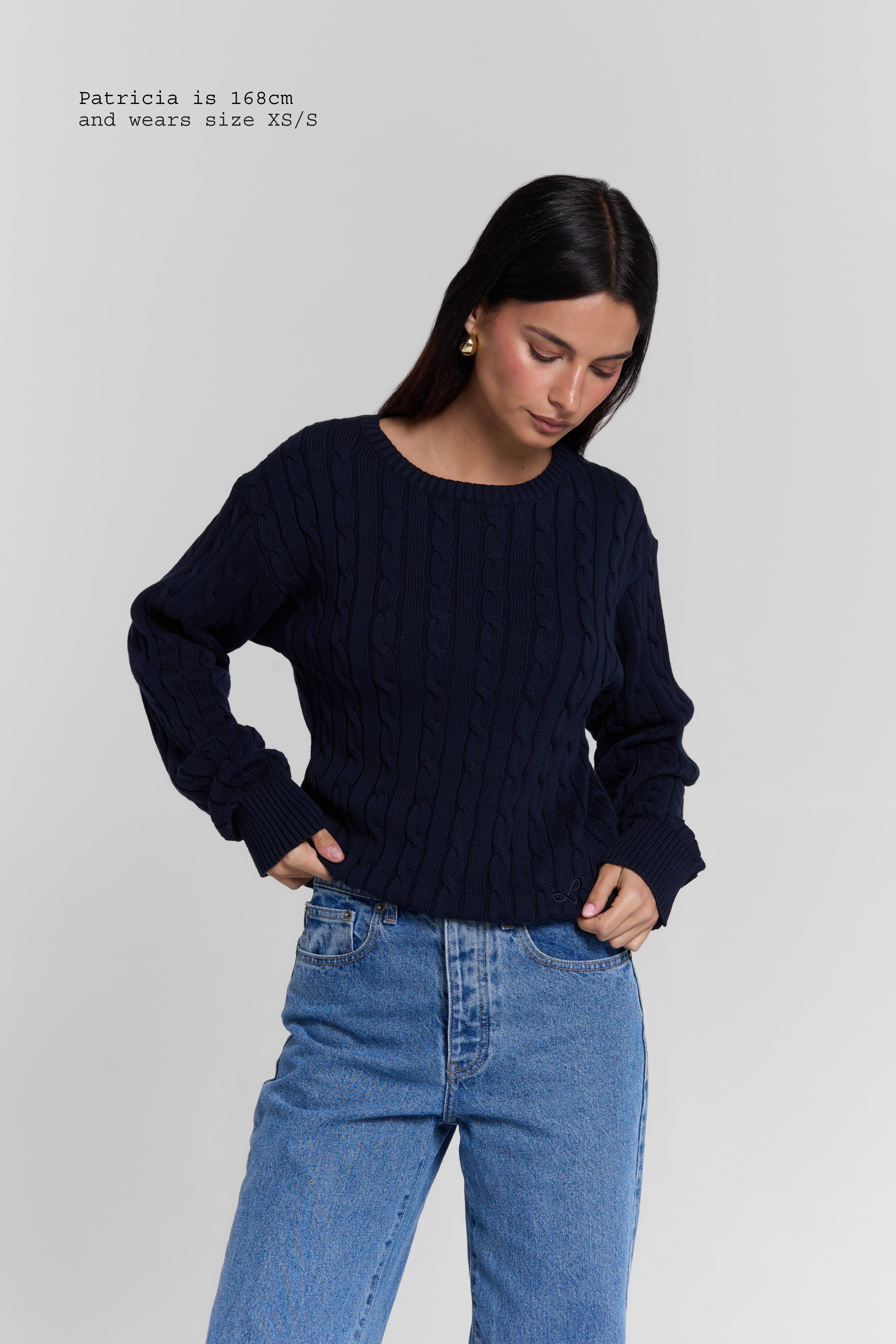 CABLE-KNIT SWEATER