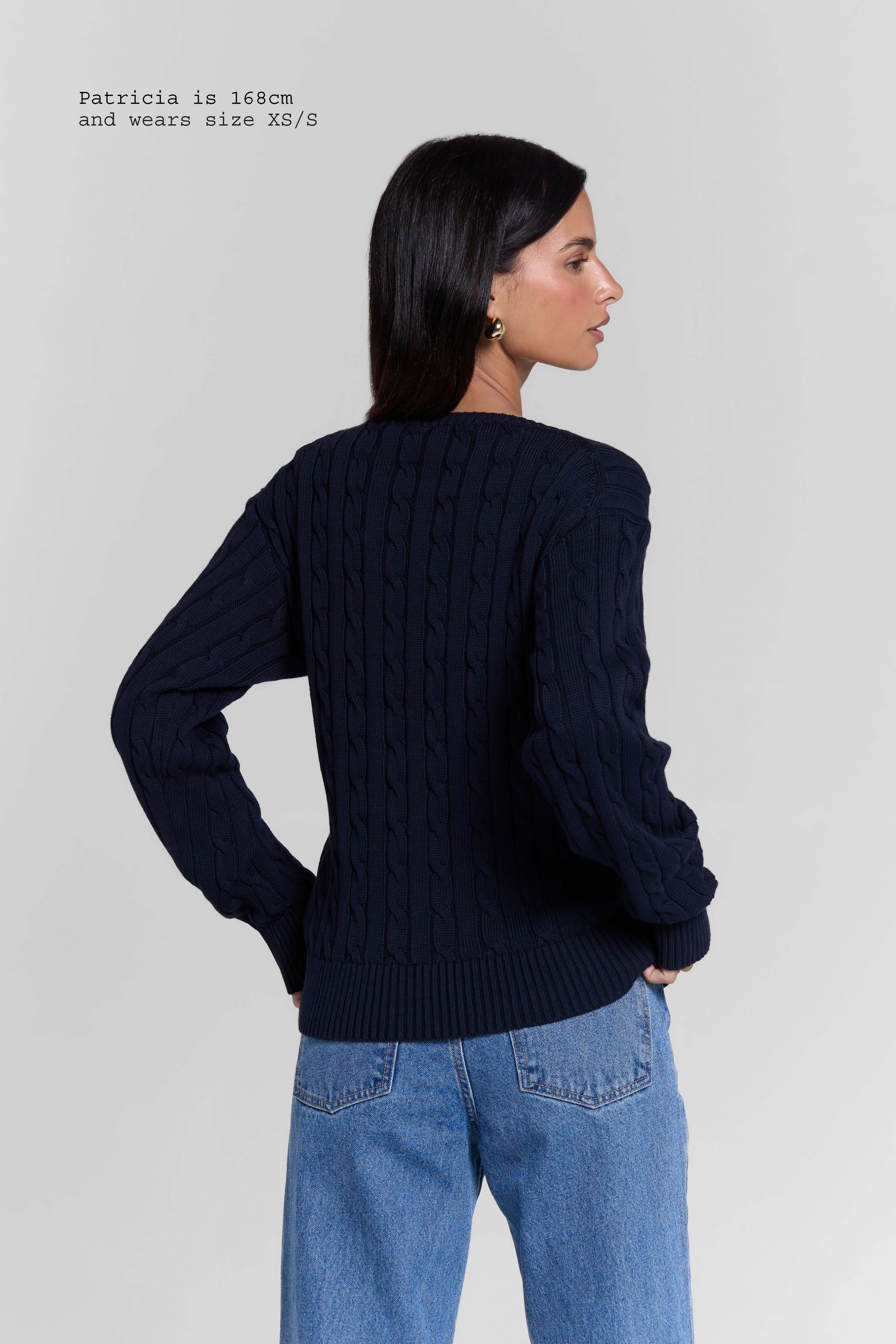 CABLE-KNIT SWEATER