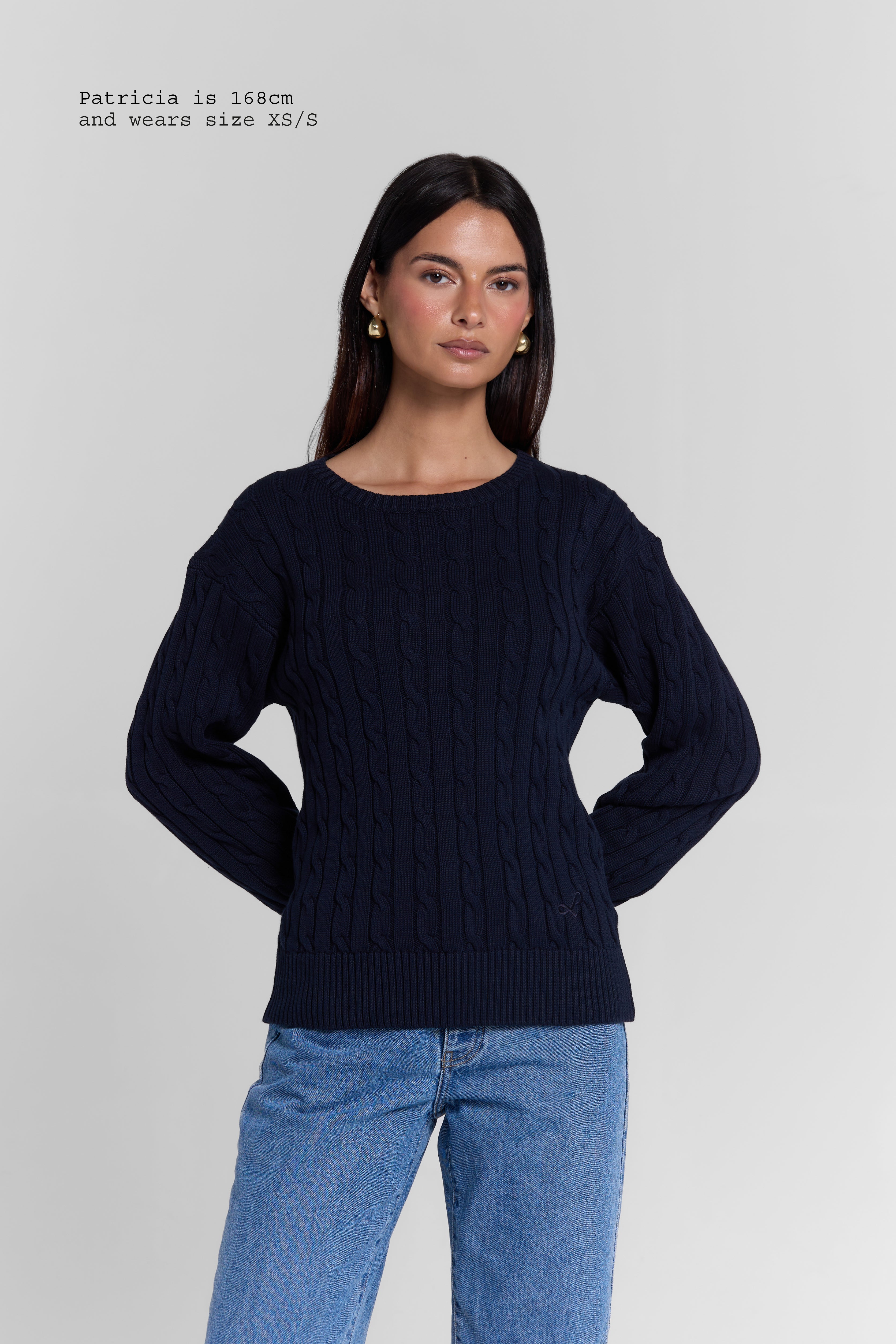CABLE-KNIT SWEATER