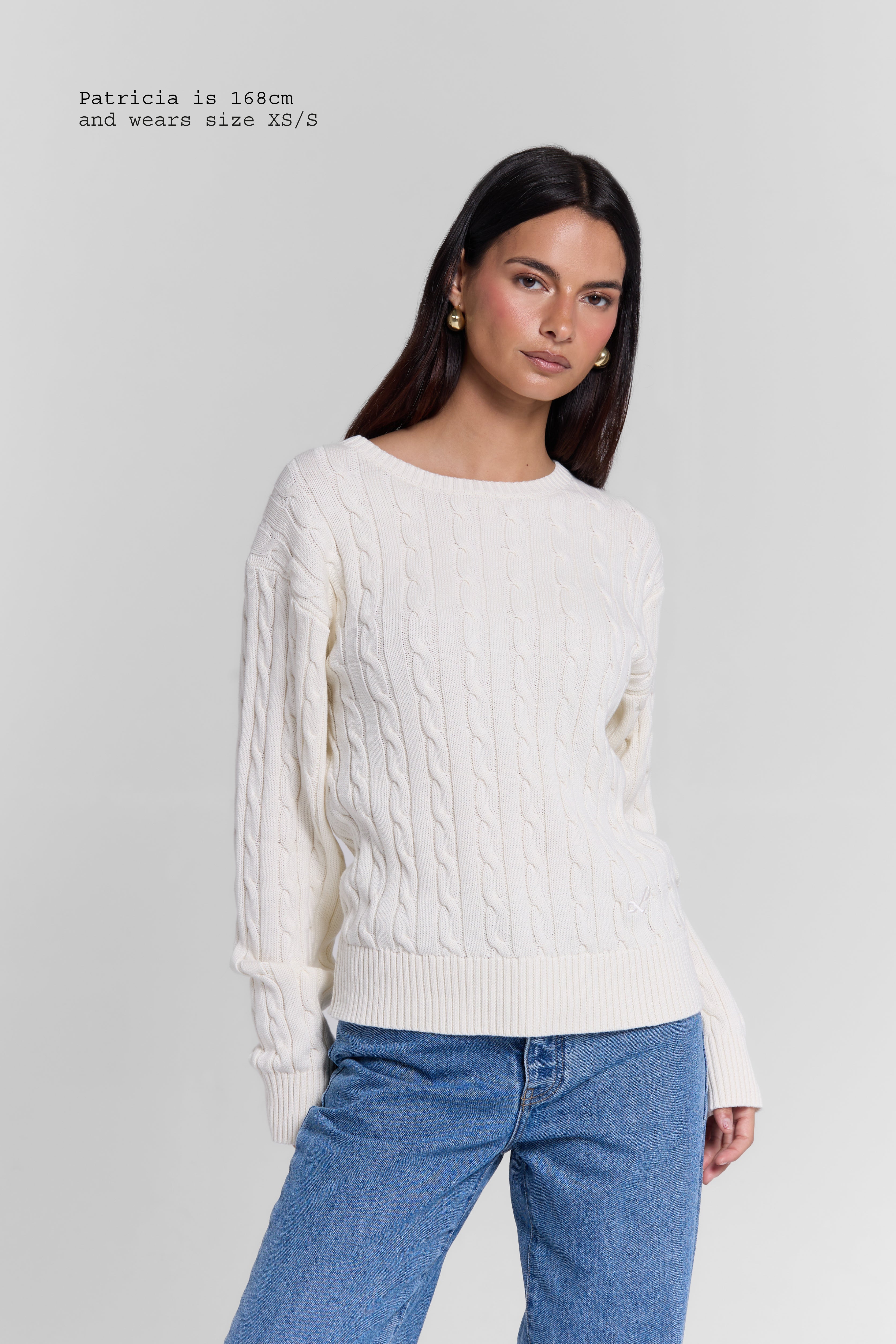 CABLE-KNIT SWEATER