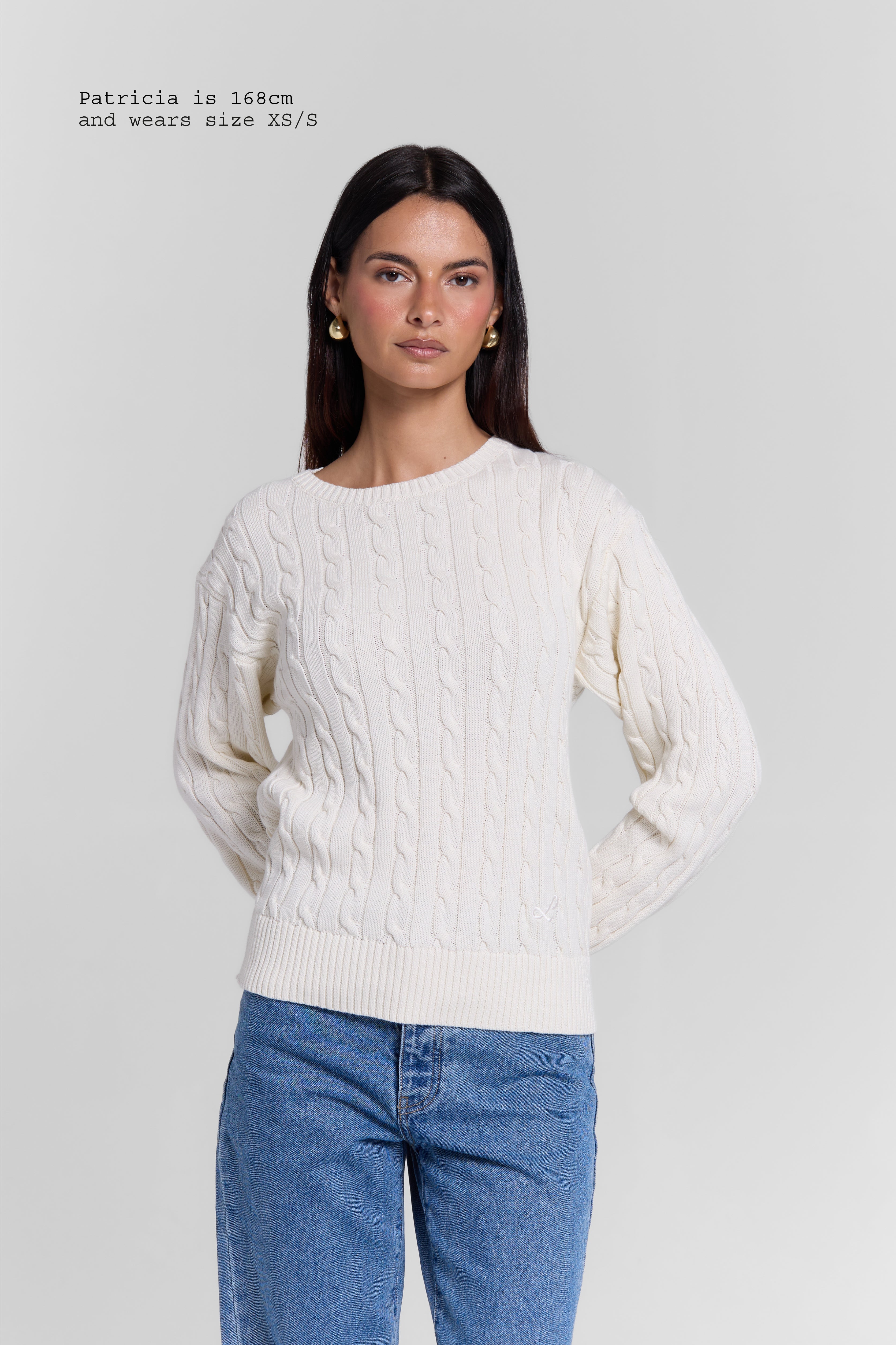 CABLE-KNIT SWEATER