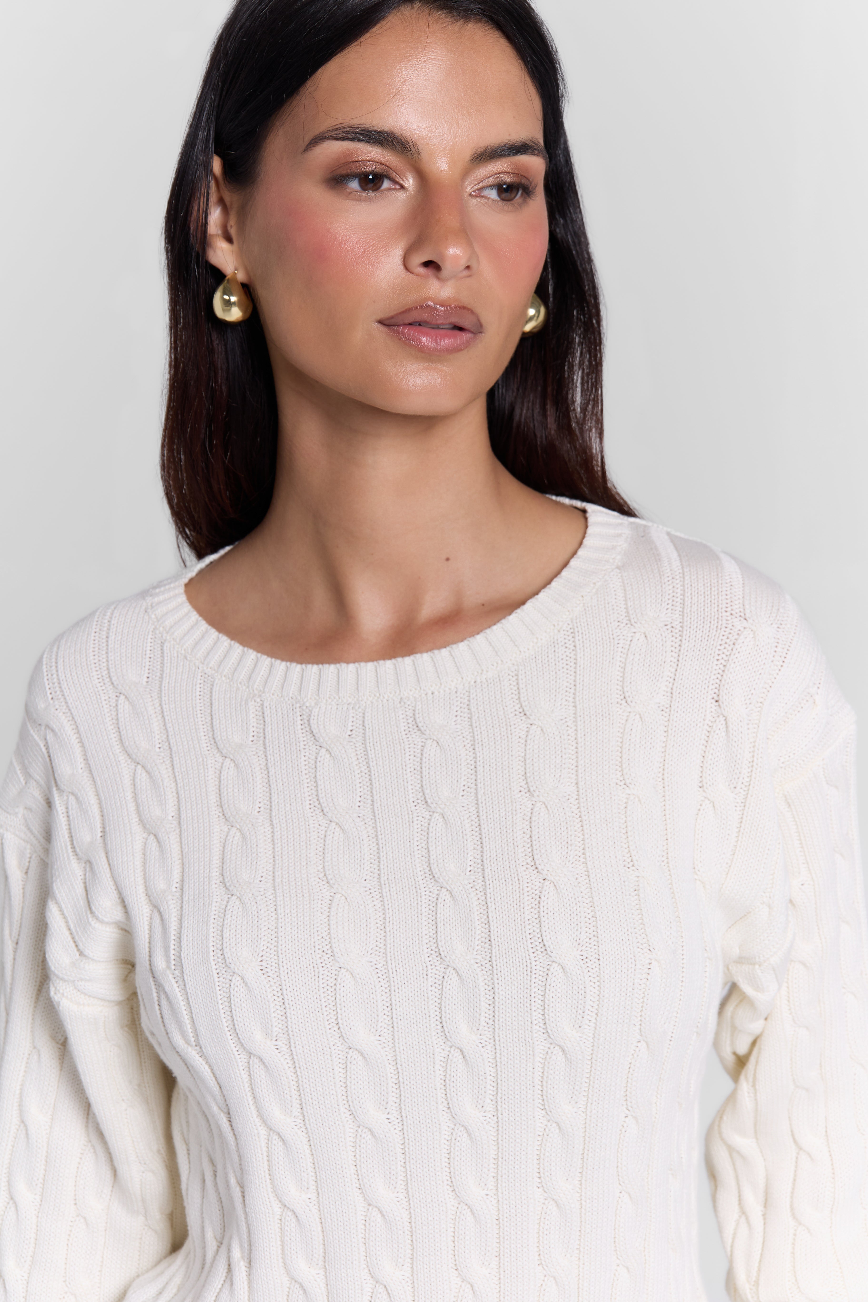 CABLE-KNIT SWEATER