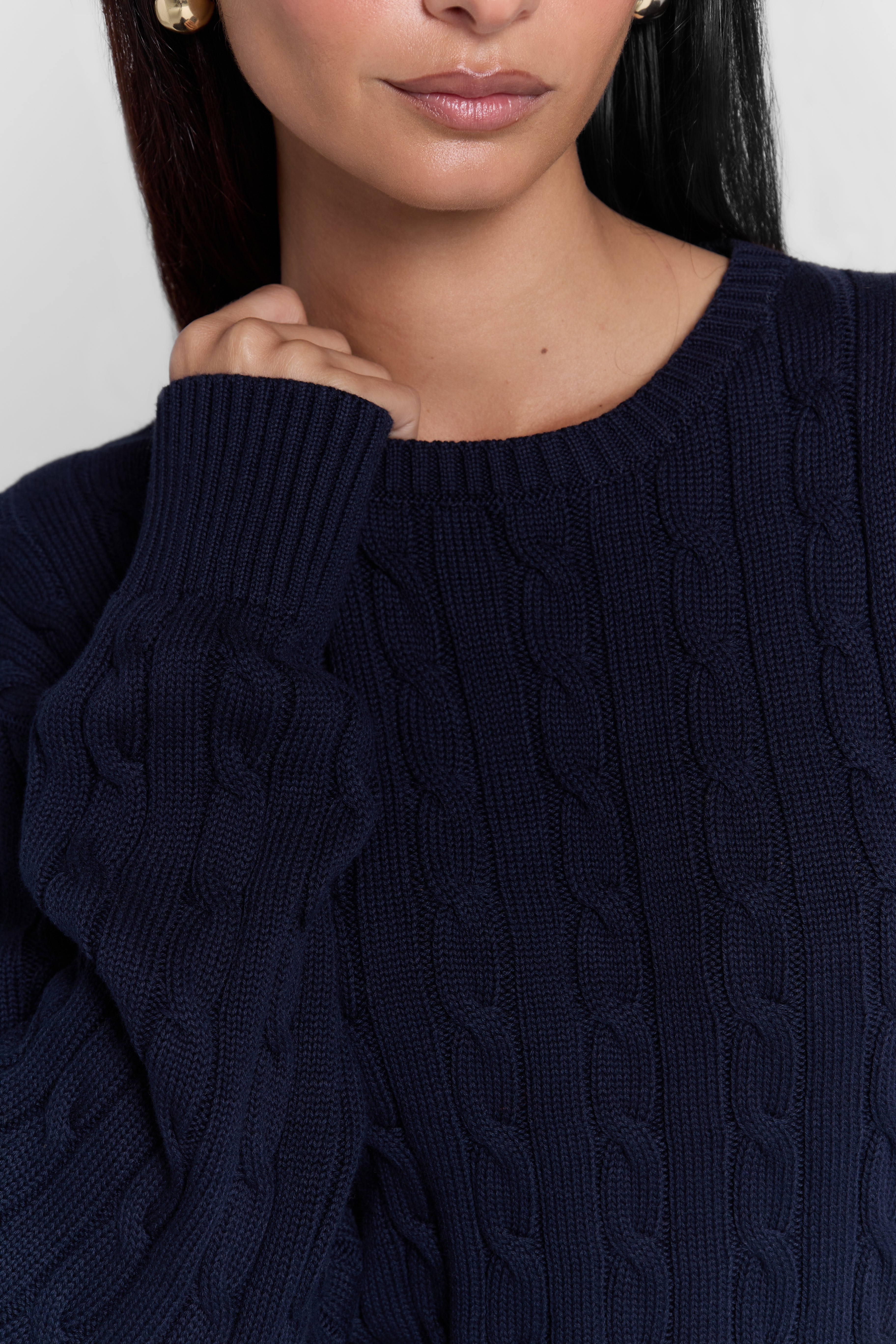 CABLE-KNIT SWEATER