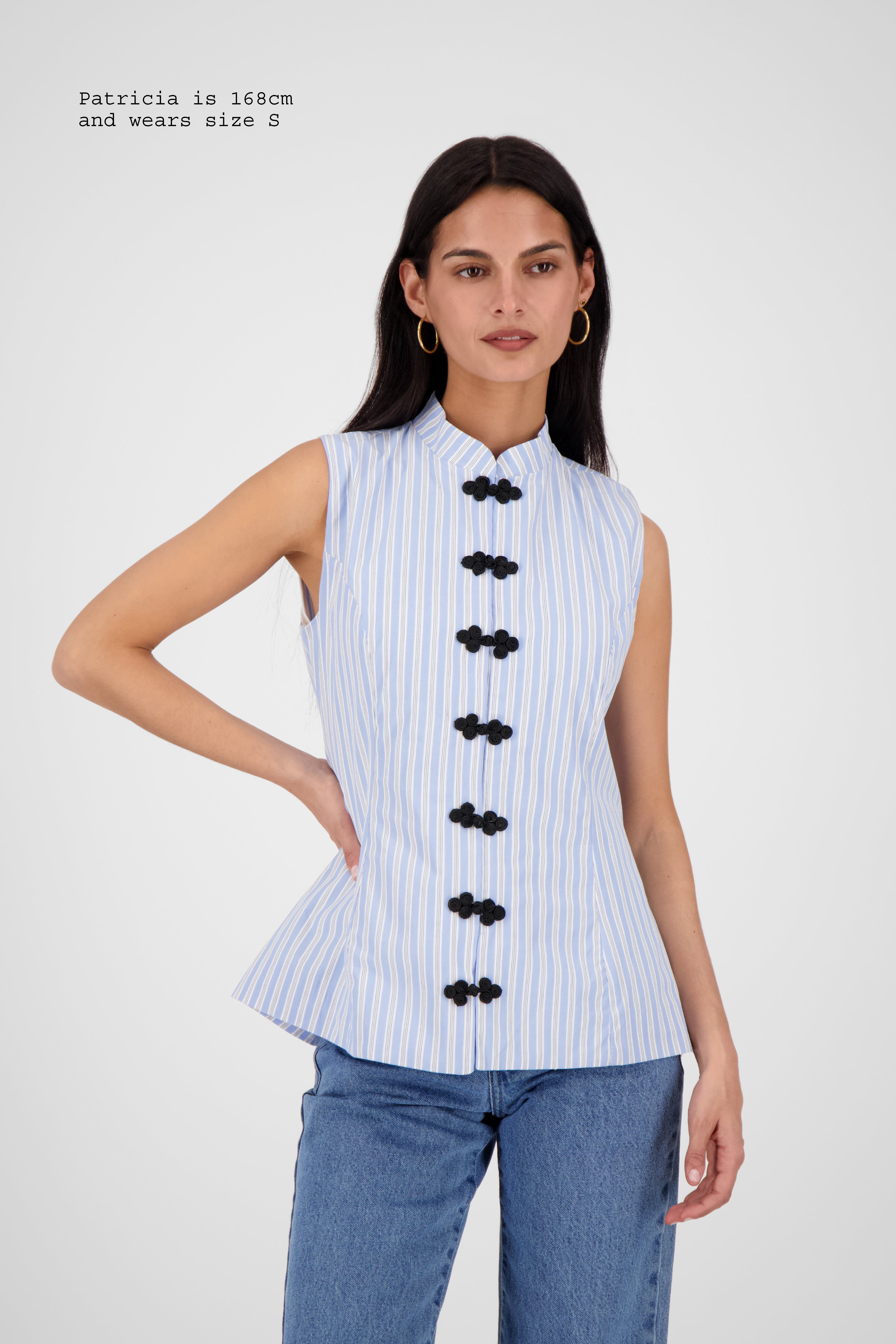 FITTED VEST WITH FASTENINGS