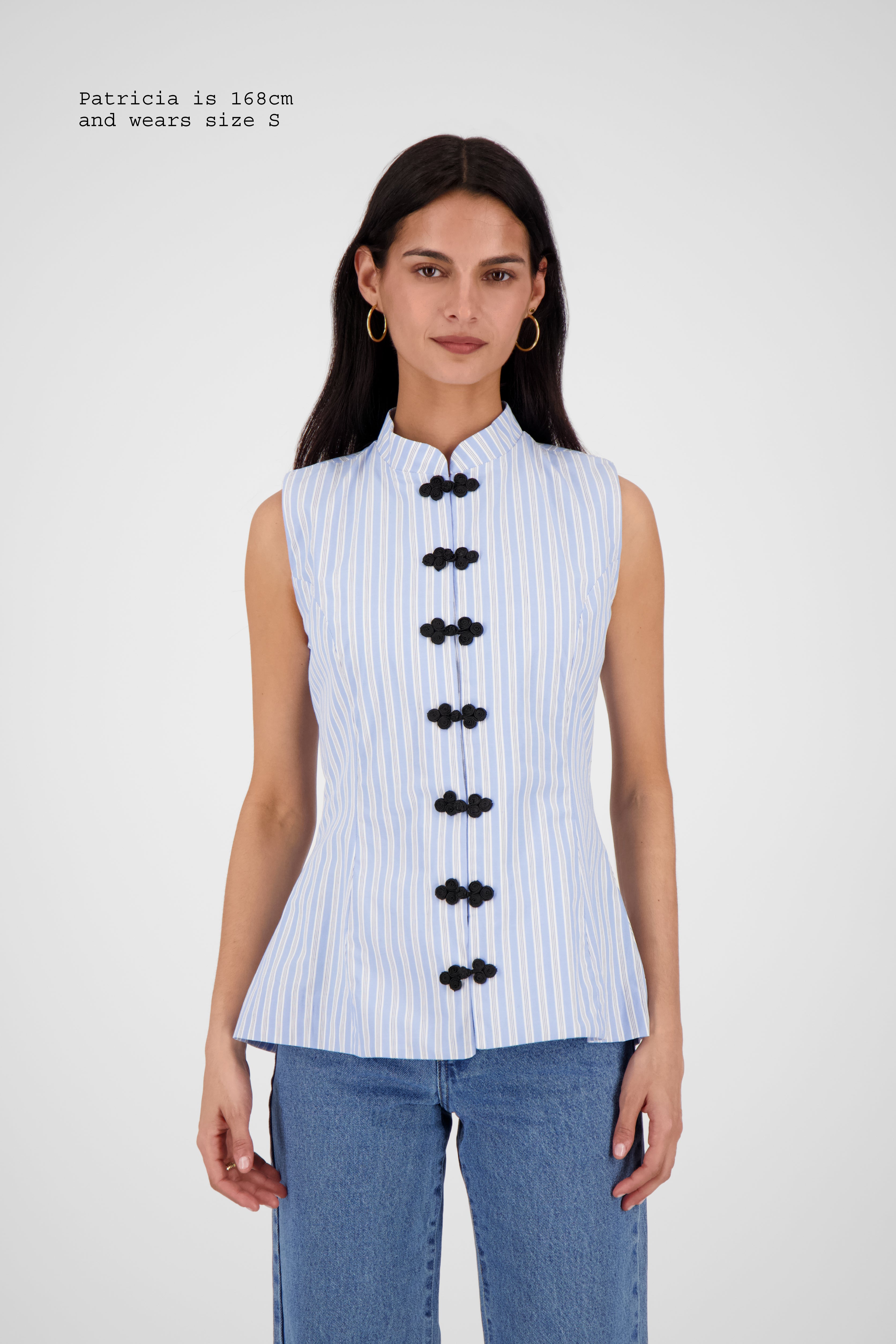 FITTED VEST WITH FASTENINGS