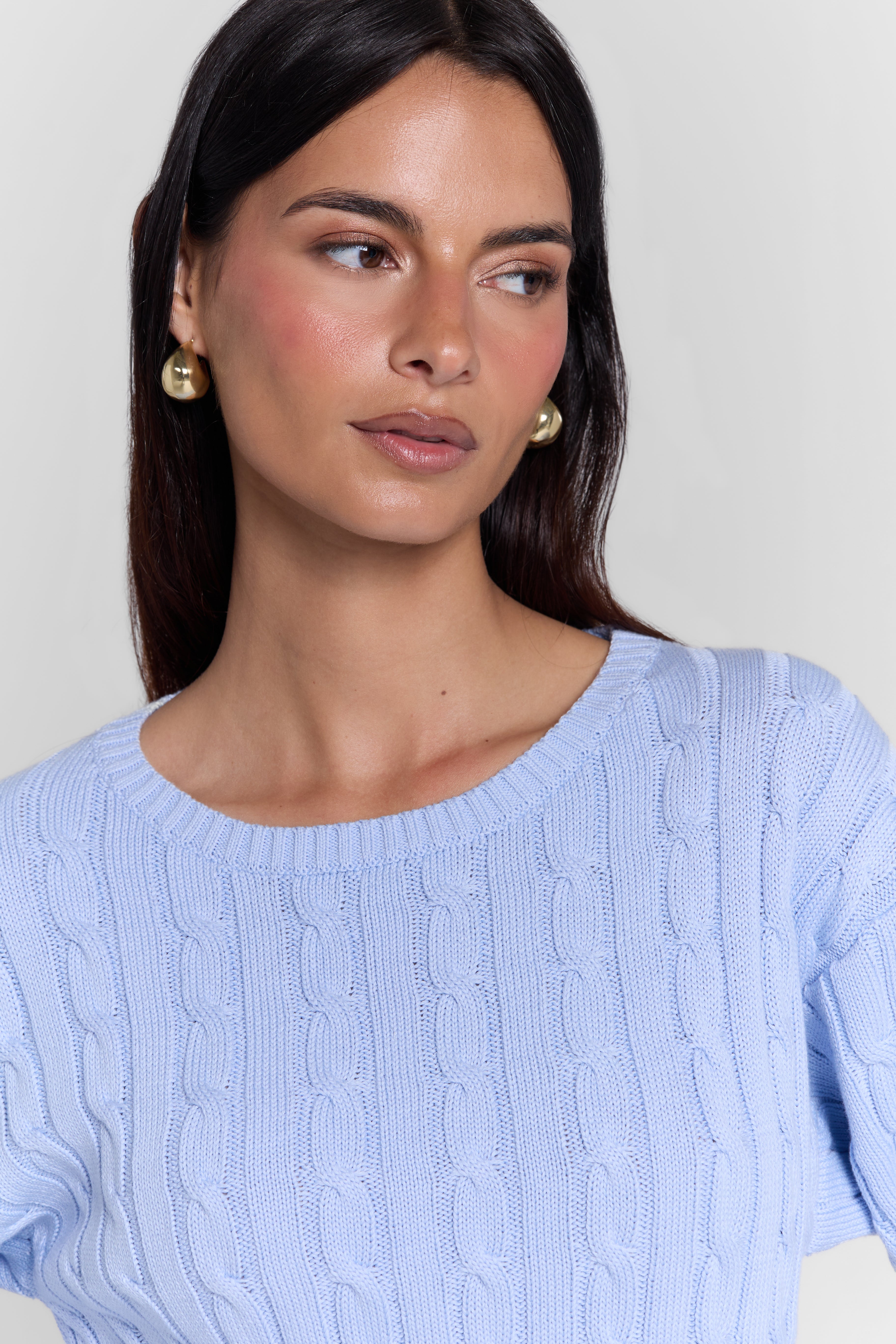 CABLE-KNIT SWEATER